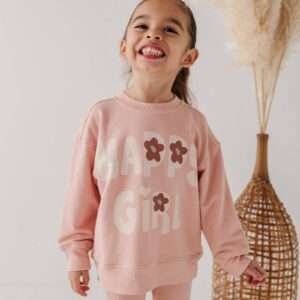 Smiling girl in pink outfit with 'Happy Girl' text.