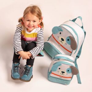 Smiling child with colorful dog-themed backpacks.
