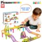Child playing with colorful toy track set