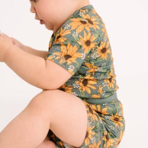 Baby wearing sunflower pattern outfit