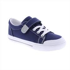 Blue kids sneaker with Velcro strap and laces.