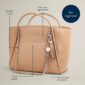 Tan tote bag with tassel and silver chain.