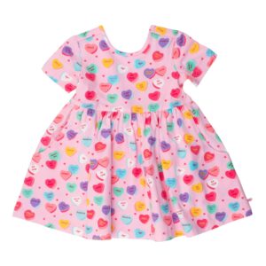 Pink dress with colorful heart patterns.