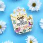 Colorful card with daisies on blue background