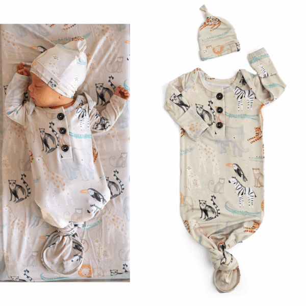 Baby wearing animal print onesie and matching hat