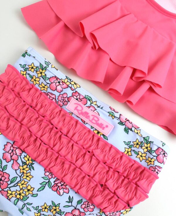 rufflebutts cheerful blossoms flounce bikini Pink ruffled floral swimsuit for girls.