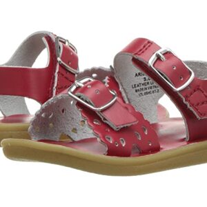 Red toddler sandals with buckles and perforated design.