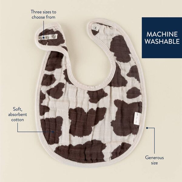 itzy ritzy *new* itzy bibs™: check yes! Cow-print baby bib, machine washable and absorbent.
