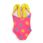 Pink kids swimsuit with sun pattern and polka dots.