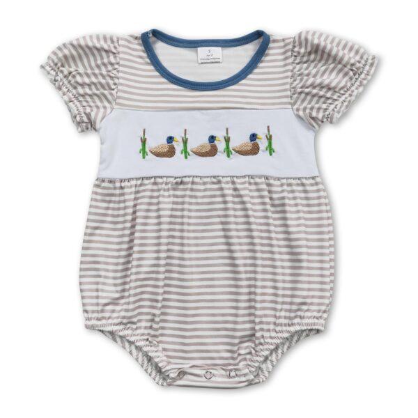 Striped baby romper with embroidered ducks pattern.