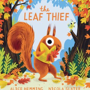 Squirrel holding leaves in colorful autumn forest.