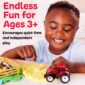 Child playing with toy tractor and clay, fun for ages 3+