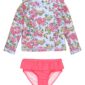 Floral long-sleeve swimsuit with pink bottoms.
