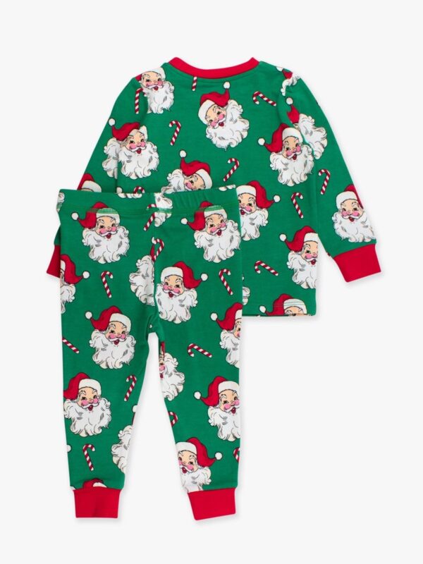 Green Santa pajamas with candy canes.