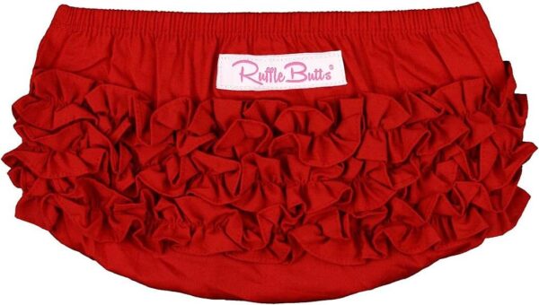 Red ruffle diaper cover with brand label.