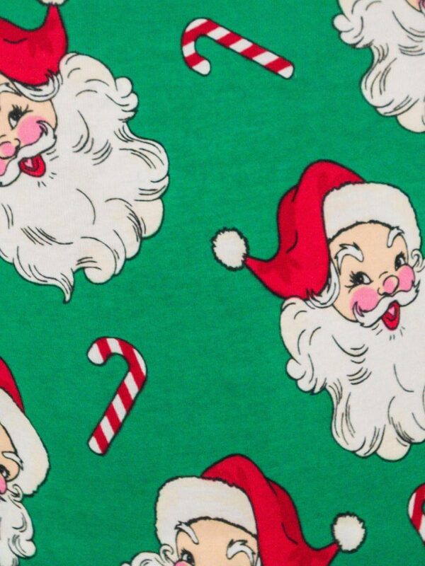 rufflebutts green santa joy long sleeve pajama set Santa faces and candy canes on green background