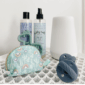 Baby bath set with lotion, spray, pacifier, pouch.