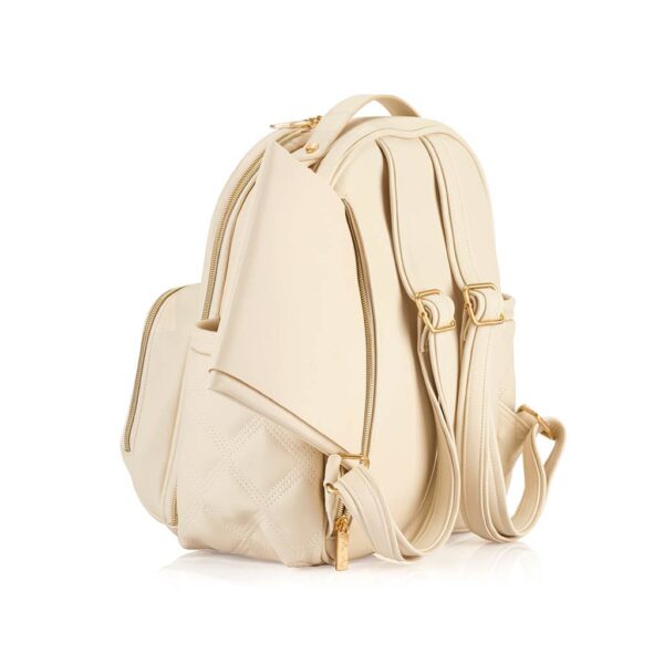 itzy ritzy milk & honey itzy mini plus™ diaper bag backpack Cream leather backpack with gold zippers and straps.