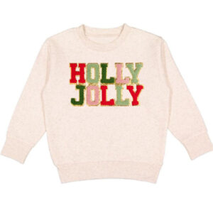 Beige sweater with 'Holly Jolly' text.