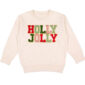 Beige sweater with 'Holly Jolly' text.