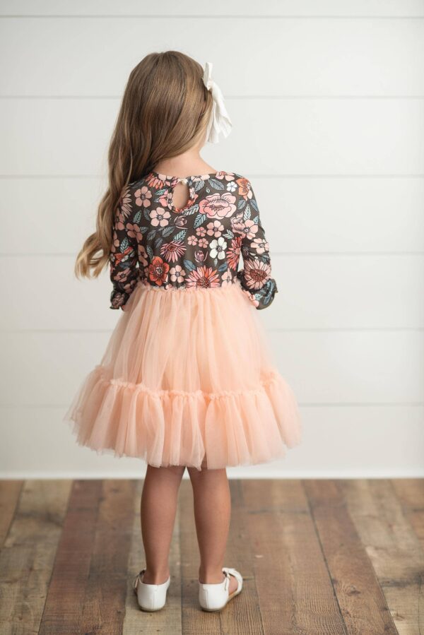 oopsie daisy kids brown & peach vintage floral tulle fall dress Young girl in floral top and peach tutu dress.