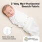 Baby swaddled in soft, stretchy fabric blanket.