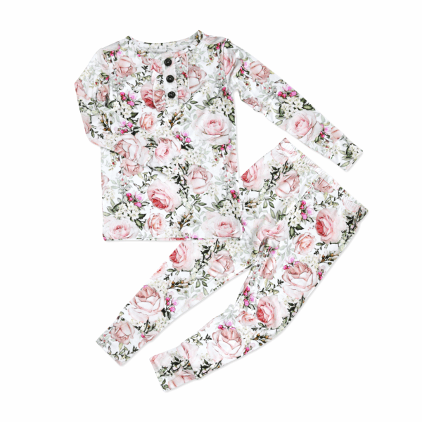 Floral print children's pajama set, pink roses design.