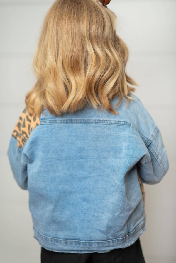 oopsie daisy kids leopard patch & light wash denim button pocket jacket Blonde child wearing denim jacket from behind.