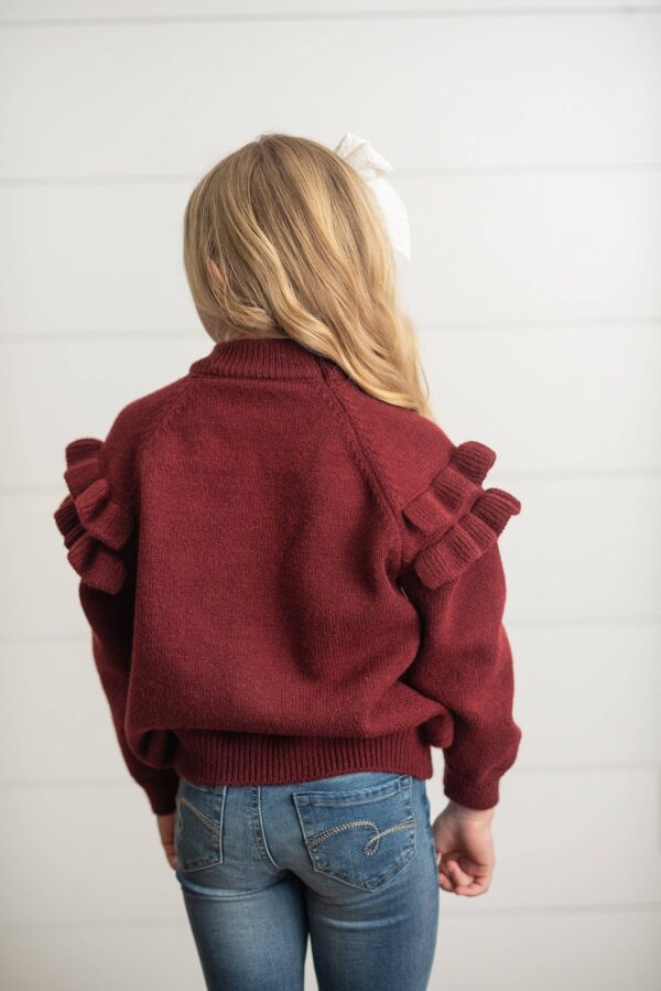oopsie daisy kids wine double ruffle crew neck fall winter sweater Girl in maroon sweater with ruffled sleeves