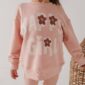 Girl in pink 'Happy Girl' outfit