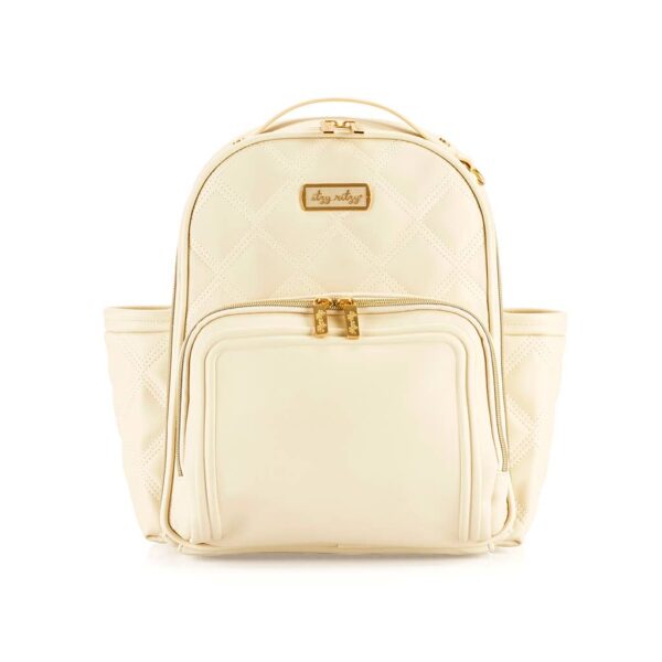 itzy ritzy milk & honey itzy mini plus™ diaper bag backpack Cream quilted diaper backpack with front pockets.