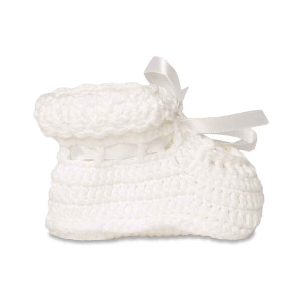White crocheted baby bootie with ribbon bow