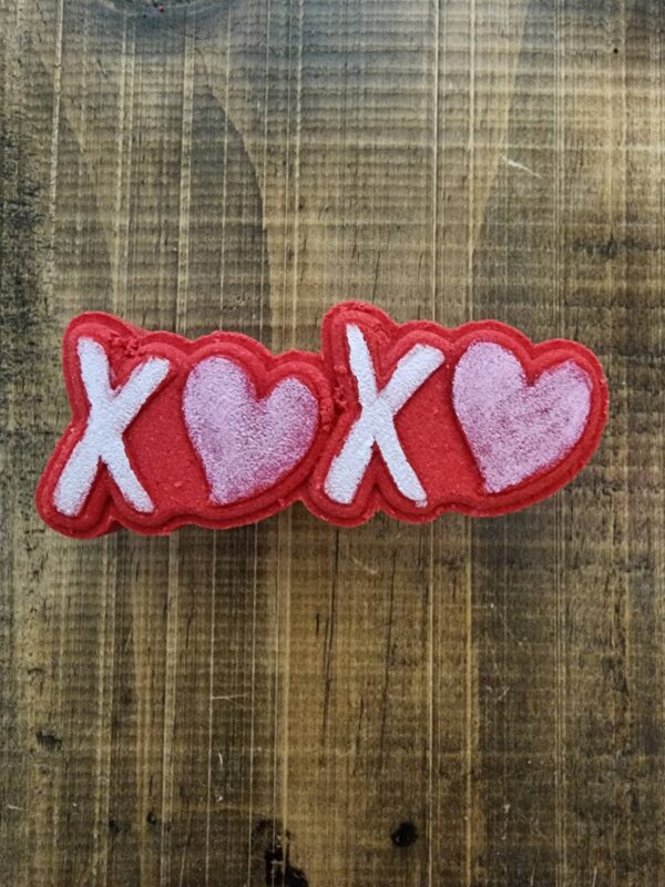XOXO red rug on wooden floor