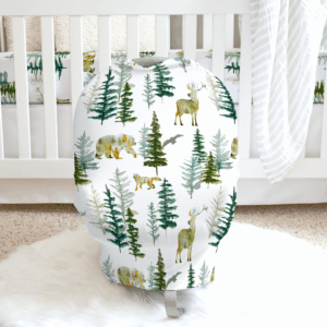 Woodland crib sheet with deer and bear design.