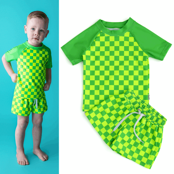 gigi and max brad green neon swim set Child wearing green checkered shirt and shorts set.