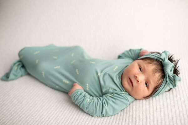 three little tots arrow print knotted newborn baby gown pajamas Newborn baby in green swaddle and headband