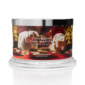 Cookies scented candle in festive packaging.