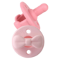 Pink baby pacifier with attached bow design.