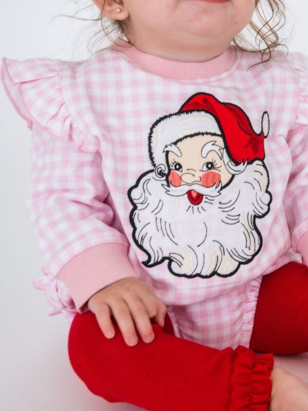 rufflebutts pink gingham santa applique romper Child in Santa sweater and red leggings.