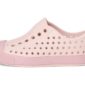Pink slip-on shoe with ventilation holes.