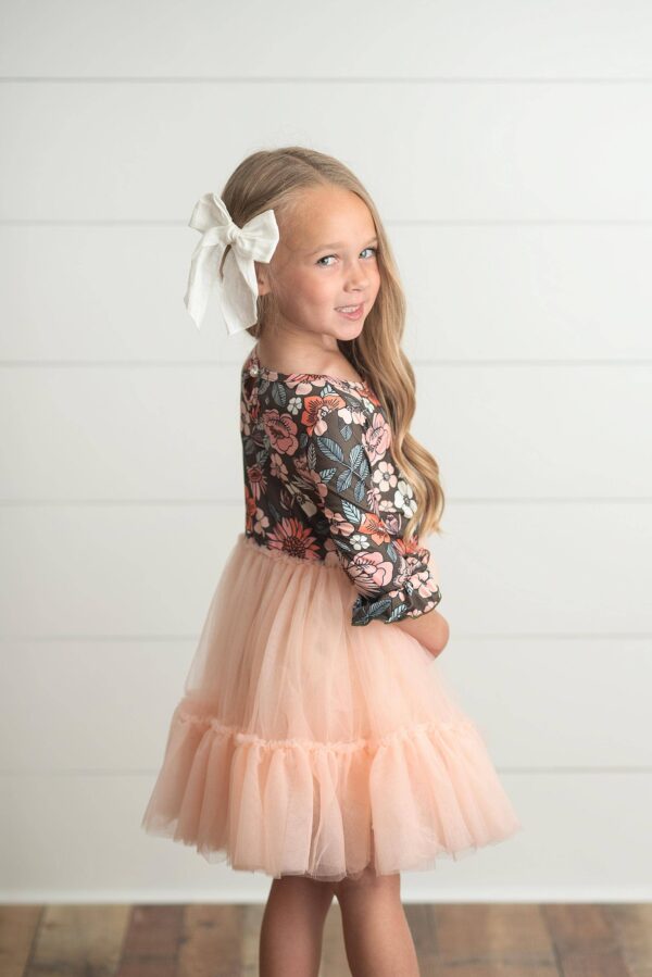 oopsie daisy kids brown & peach vintage floral tulle fall dress Young girl in floral dress, white bow hair