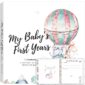 Baby memory book cover and open pages.