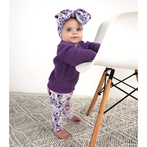 gigi and max emerson legging and sweater set Baby standing by chair in purple outfit