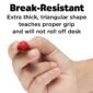 Hand holding break-resistant triangular red crayon.