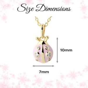 Gold ladybug pendant with pink enamel, size 7x10mm.