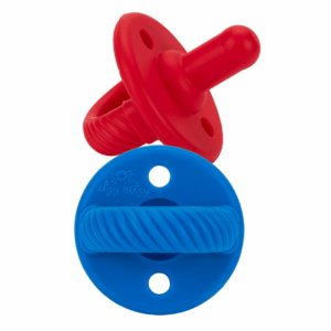 Red and blue pacifiers with textured handles.