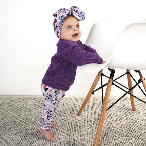gigi and max emerson legging and sweater set Baby in purple sweater standing by chair