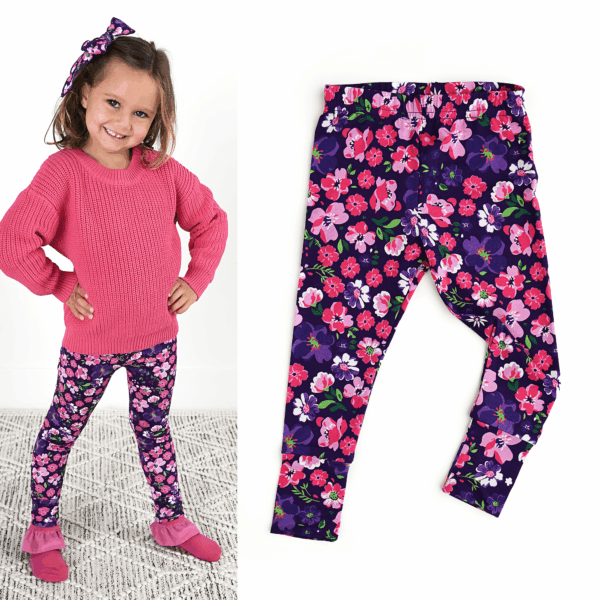 gigi and max mila leggings and sweater set Girl in floral leggings with pink sweater and bow.