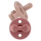 Pink bow pacifier set with logo detail.