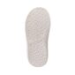 Sole of a white sneaker with textured pattern.